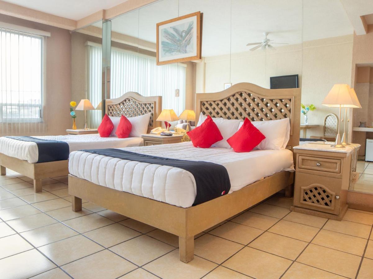 Capital O Hotel Villa Monini 푸에블라 외부 사진