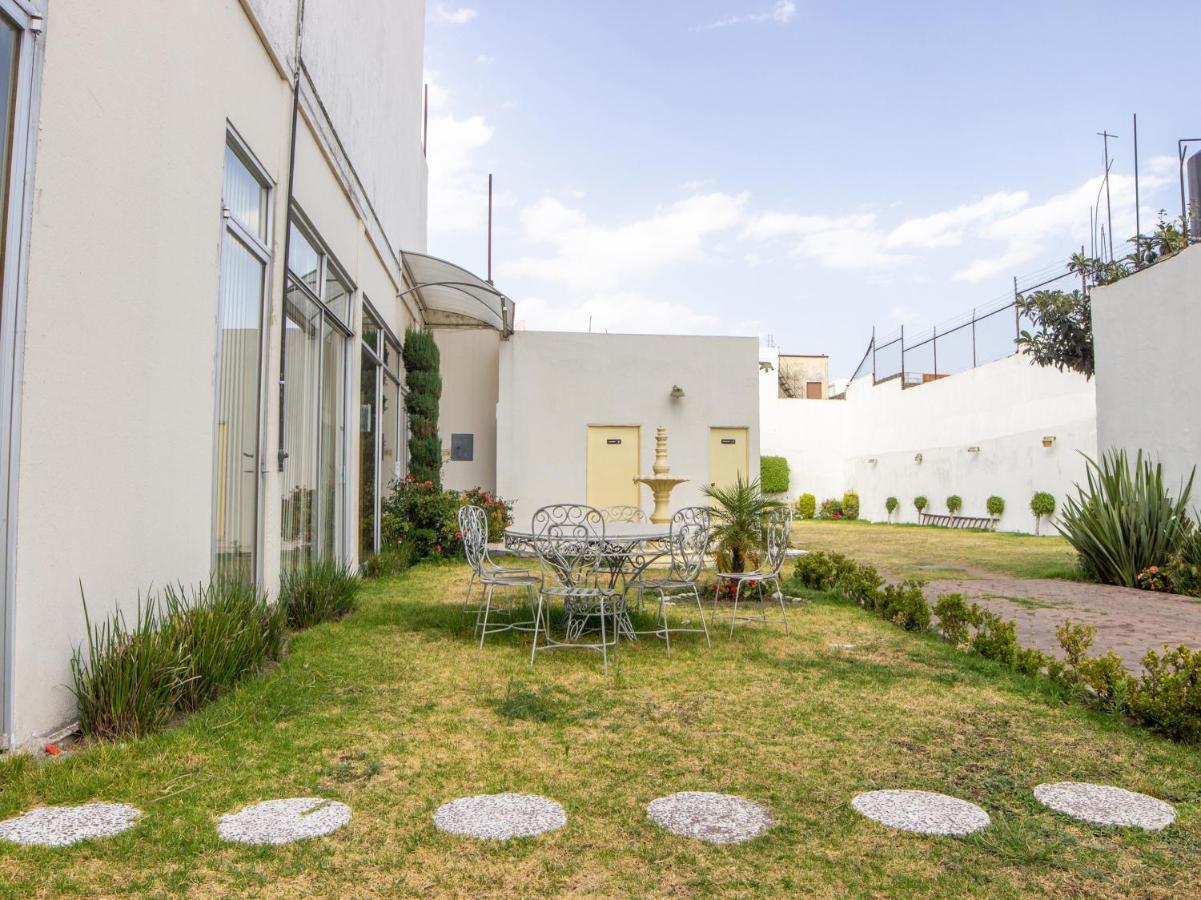 Capital O Hotel Villa Monini 푸에블라 외부 사진